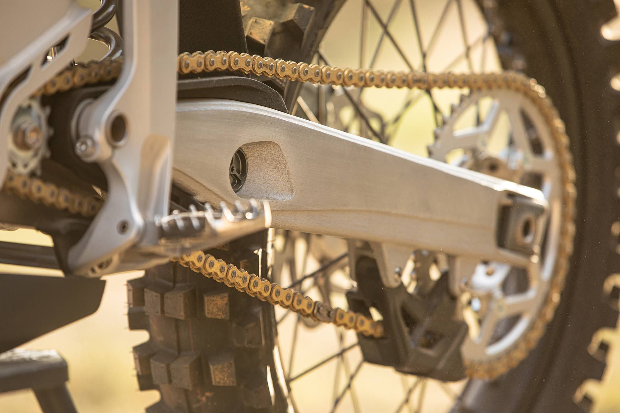 Captive adjustment axle slider block makes chain adjustment easier and more accurate.