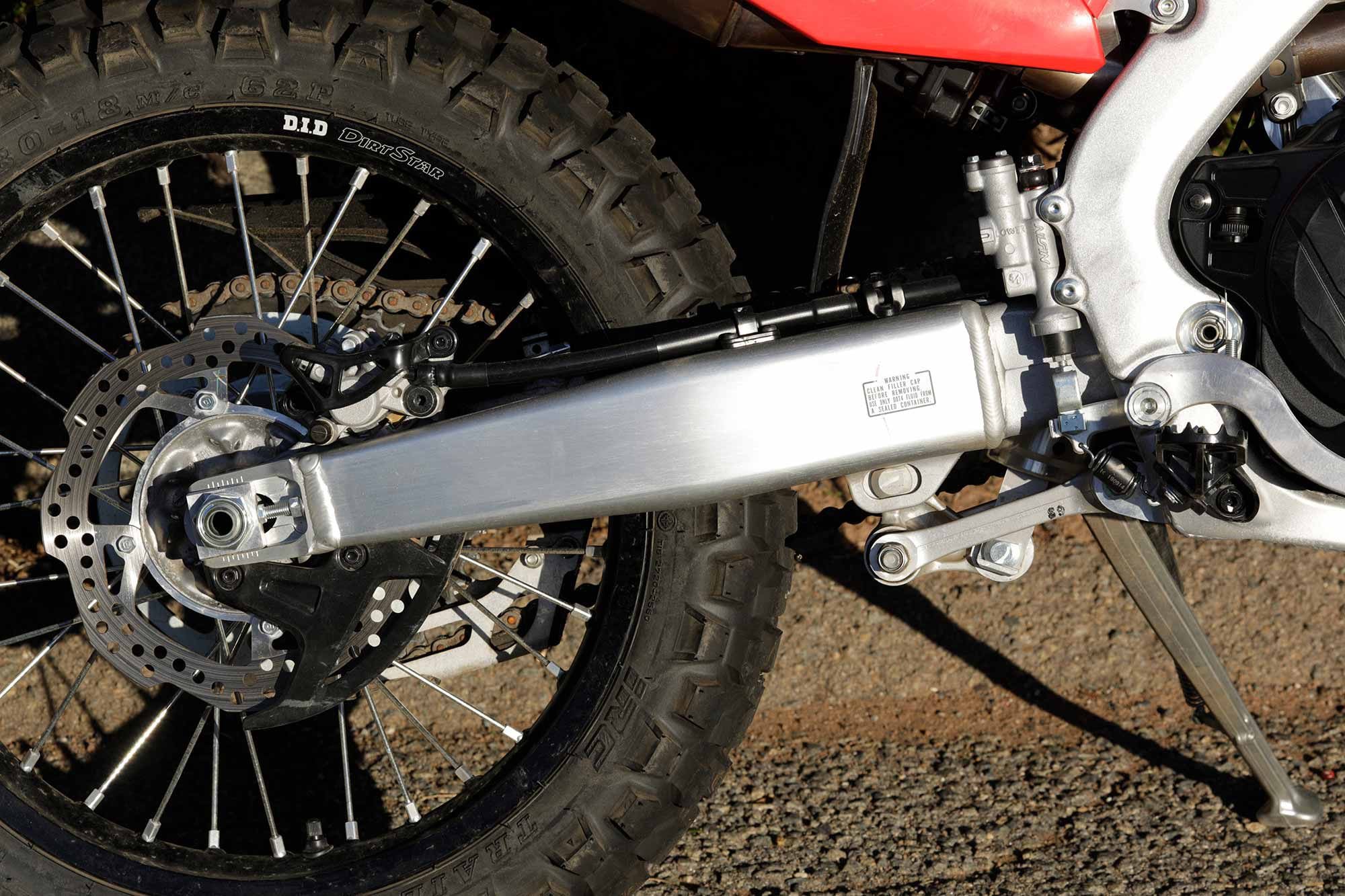 The CRF450RL shares the R’s swingarm with special noise damping material on the inside to help the RL ride more quietly on the street.