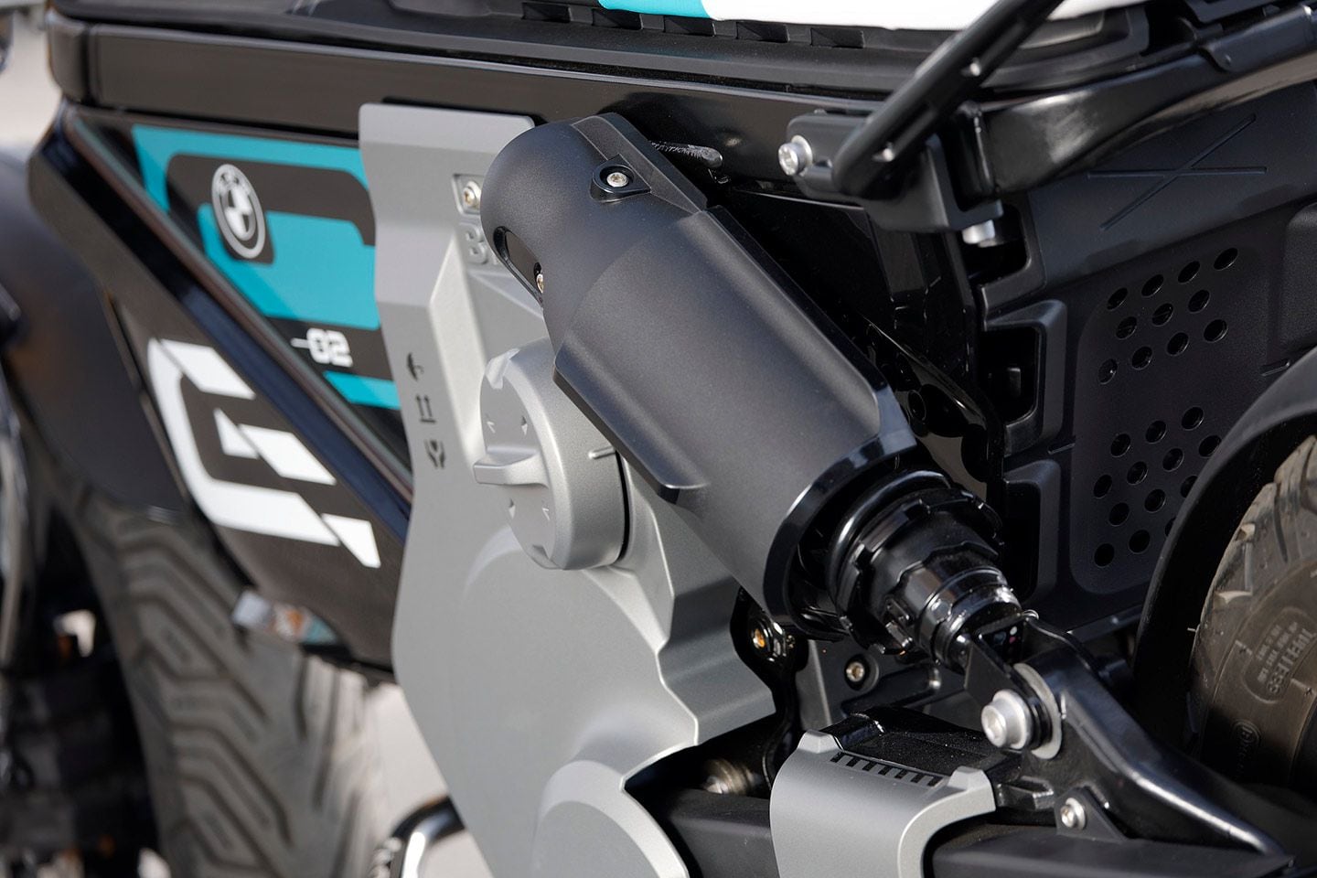 The rear shock is directly mounted to the aluminum swingarm and is adjustable for spring preload. A 14-inch disc wheel with a 150/70-14 tire rolls at the other end.