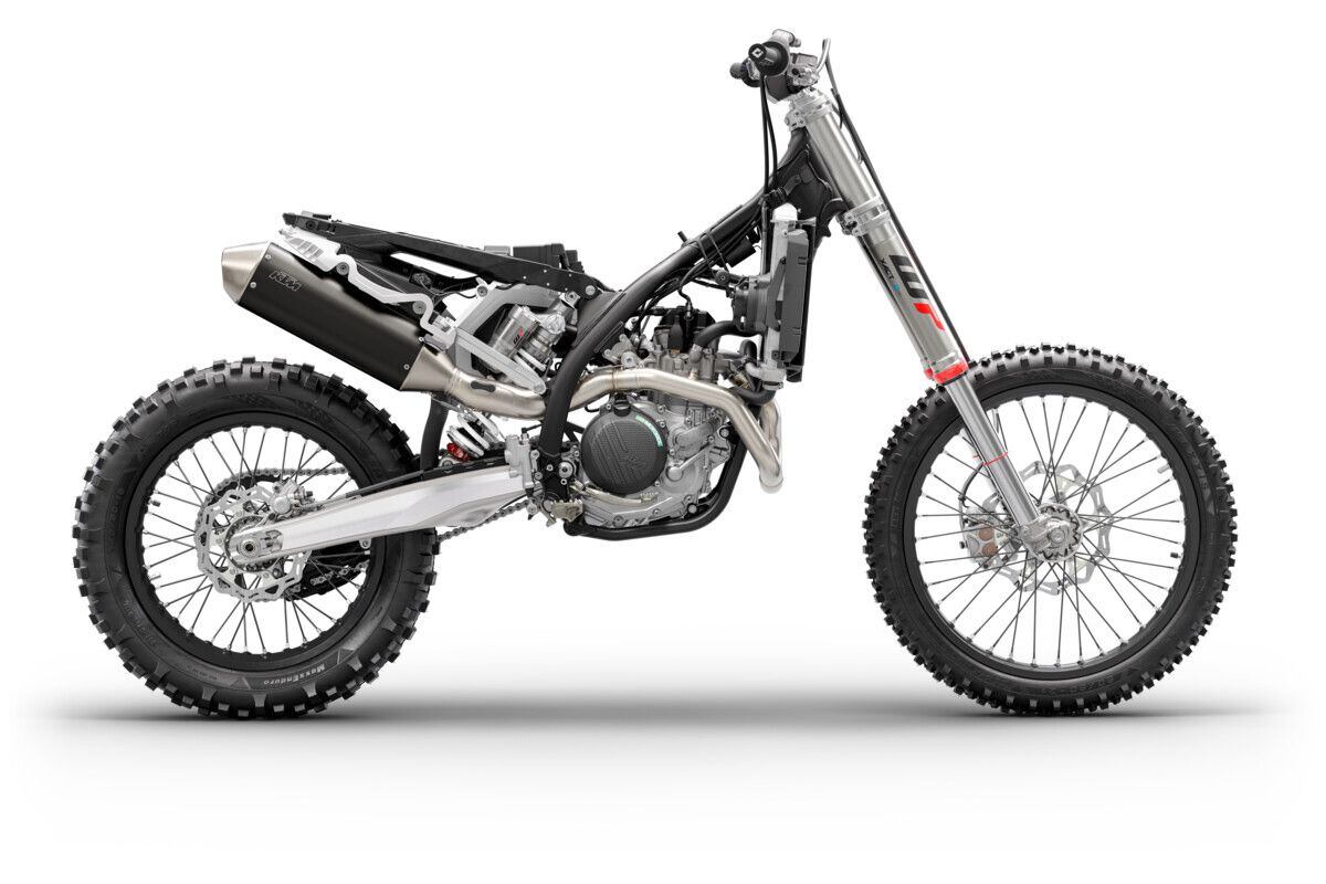 The EXC's revised steel cradle frame includes a forged steering head and tighter spacing between the footpegs.