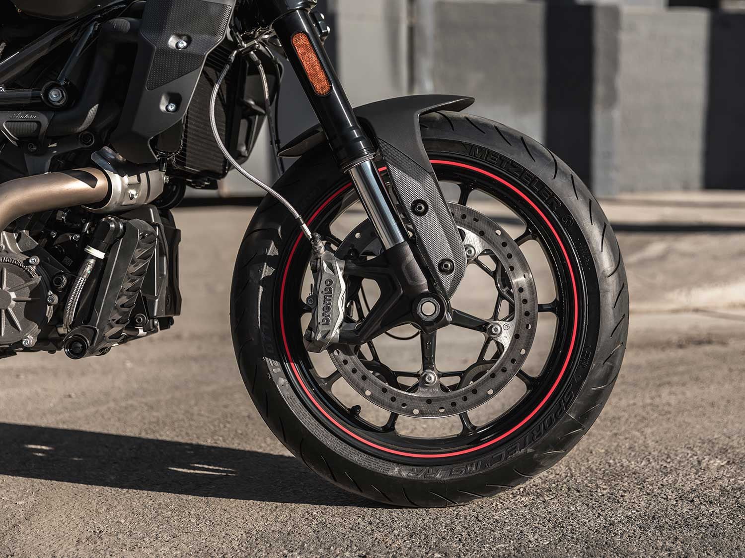 The Indian Motorcycle FTR ditches its 1200 nomenclature and its 19/18-inch wheel combo for a pair of road conventional 17-inch hoops.