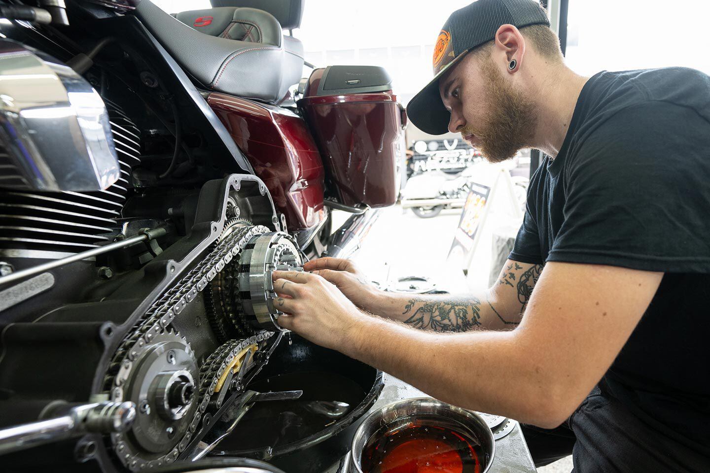 Some work so that others may party. Mechanic Kaleb Fletcher working on a clutch at the Cycle Solutions activation at Daytona Harley-Davidson.