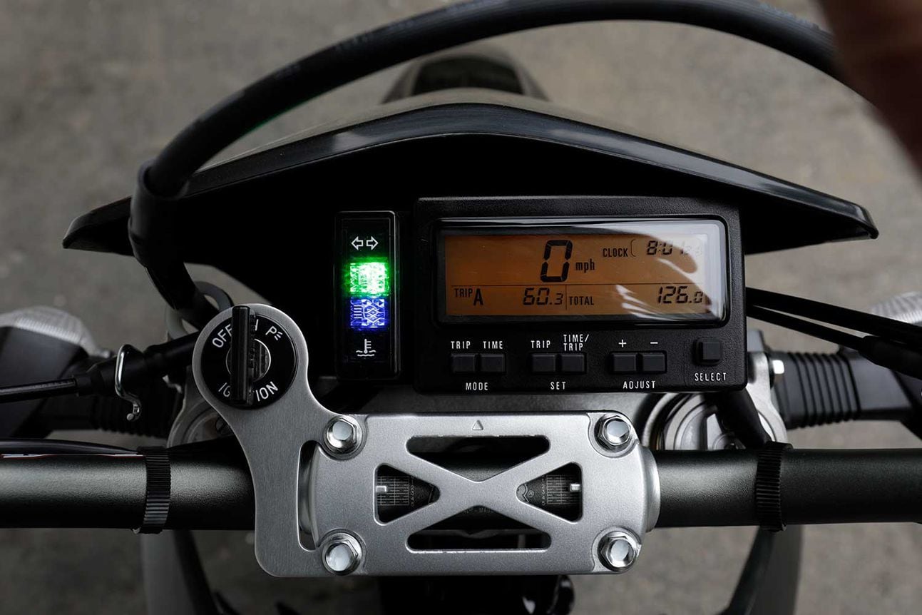 Simple LCD instrumentation keeps tabs on the DR-Z’s vitals. Riders can recalibrate the speedometer/odometer function based on larger (or smaller) circumference of aftermarket tires.