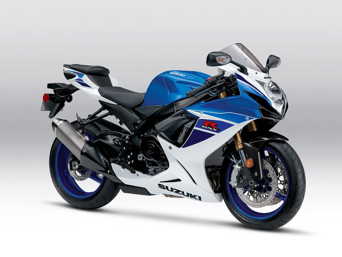 Suzuki doesn’t do much lifestyle photography, but it passes the savings on to you. The 2024 Suzuki GSX-R750 in Pearl Brilliant White/Metallic Triton Blue.