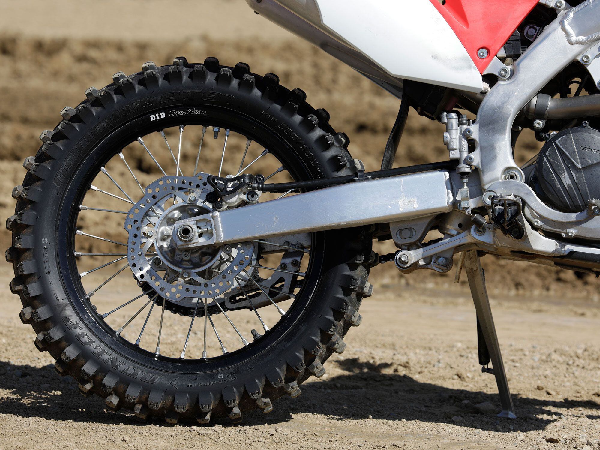 The CRF250RX employs a more forgiving 18-inch rear wheel versus the 19-inch found on a moto bike. This affords greater comfort on trail with an extra degree of tire sidewall cushion.