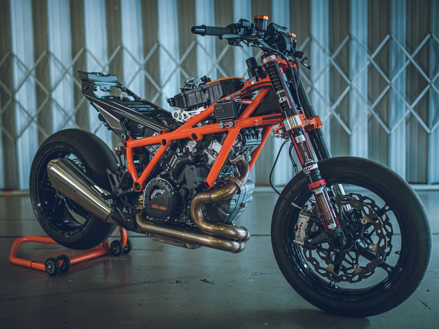 The 2020 1290 Super Duke R with its clothes off. Note the secondary showerhead-style fuel injectors, redesigned frame and subframe, and larger-diameter header pipes. These updates net a significantly improved riding dynamic.