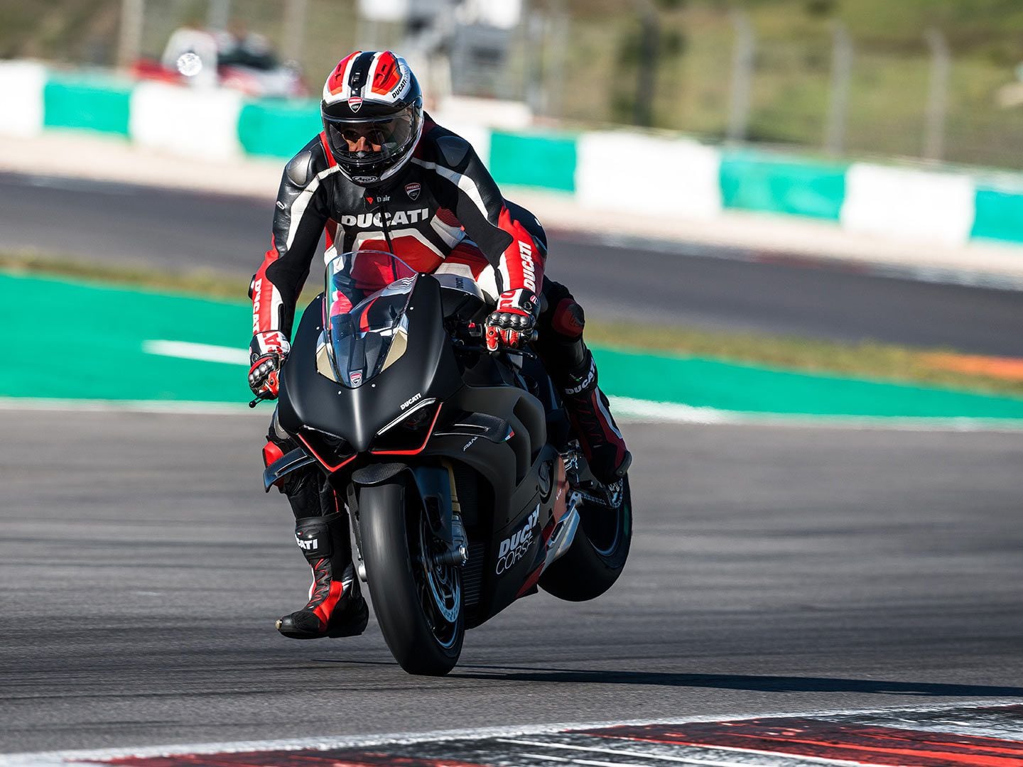 Stoppie on by! Brembo Stylema R front brakes keep corner entry speeds high and tight.
