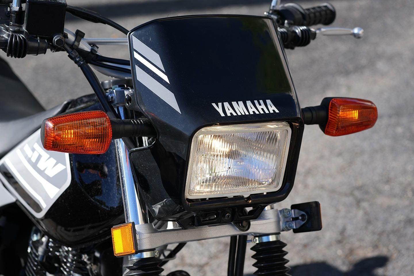 You know when you are from the ‘80s when… a rectangular halogen bulb headlight is an ode to the time when this motorcycle was originally released.