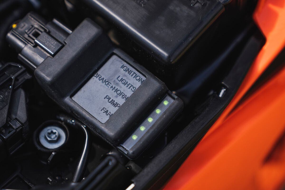 Whenever an over-current situation is detected, KTM's new Offroad Control Unit automatically deactivates individual components, and then flags the issue with a red LED. This removes the need to carry fuses and simplifies diagnosing trailside electronic issues.
