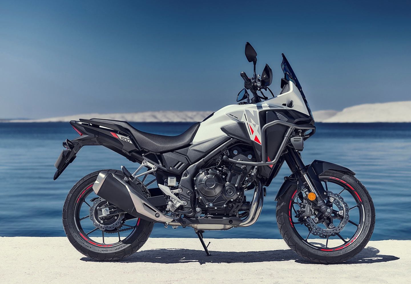 As usual, Honda continues to taunt us by giving European riders three slick color options like this Pearl Horizon White. As for here, in the States? Hope you like just basic black.