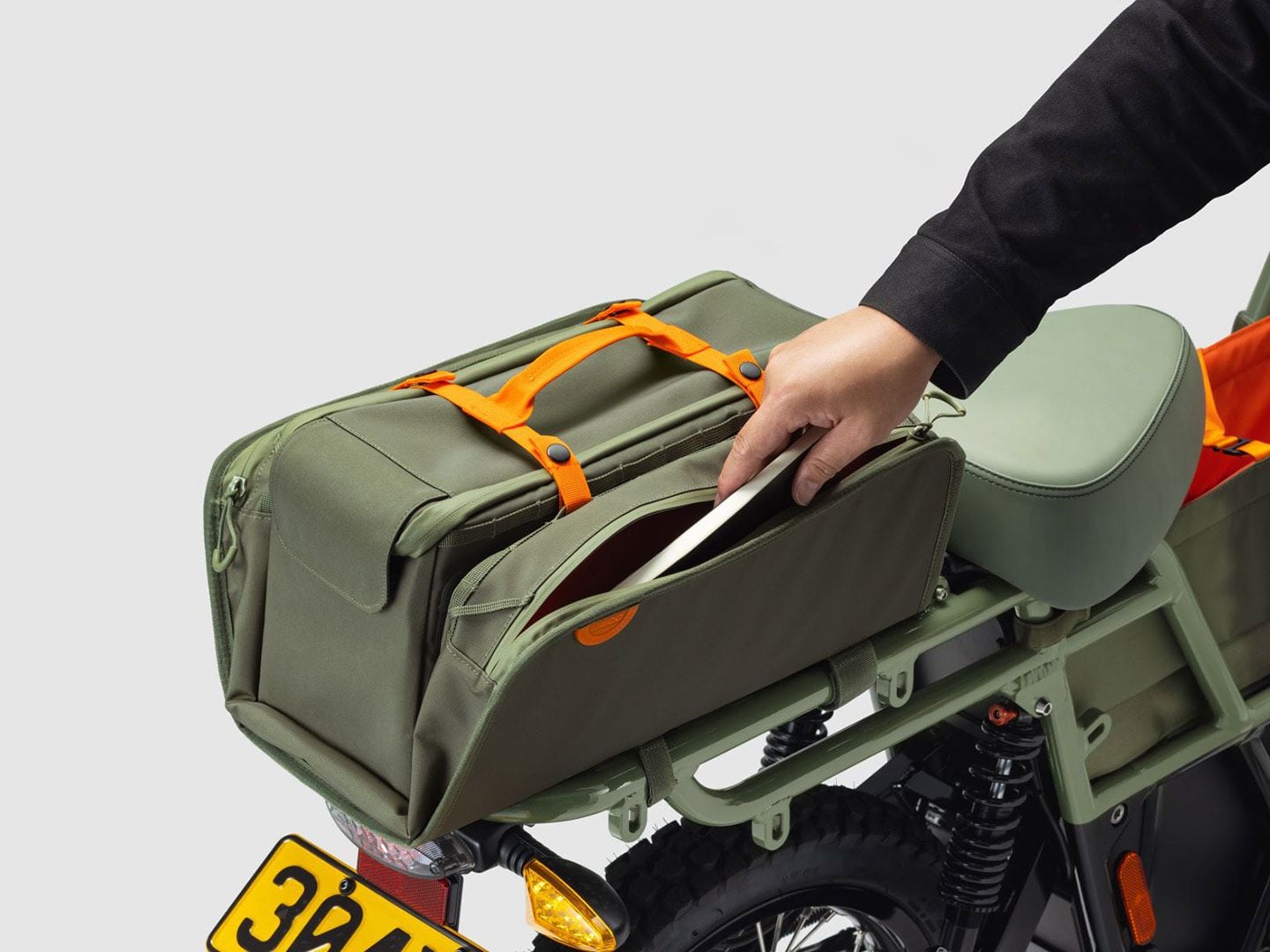 Waterproof tail bag doubles as a removable tote.