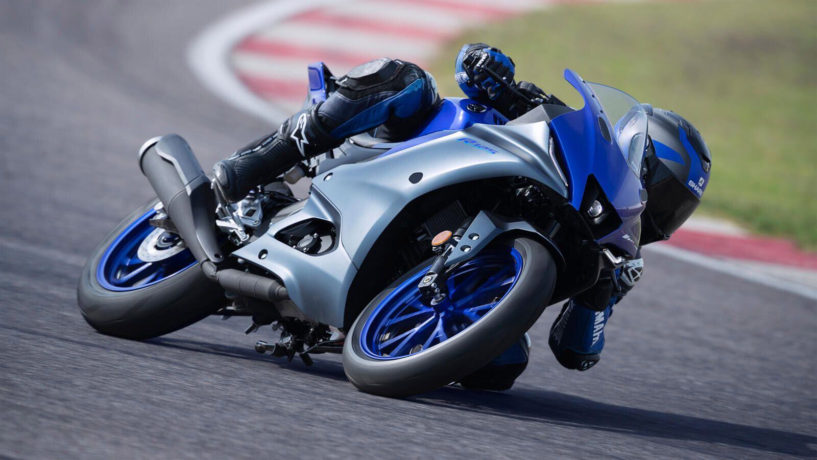 Mind the kickstand; the Yamaha R125 gets low on track day.