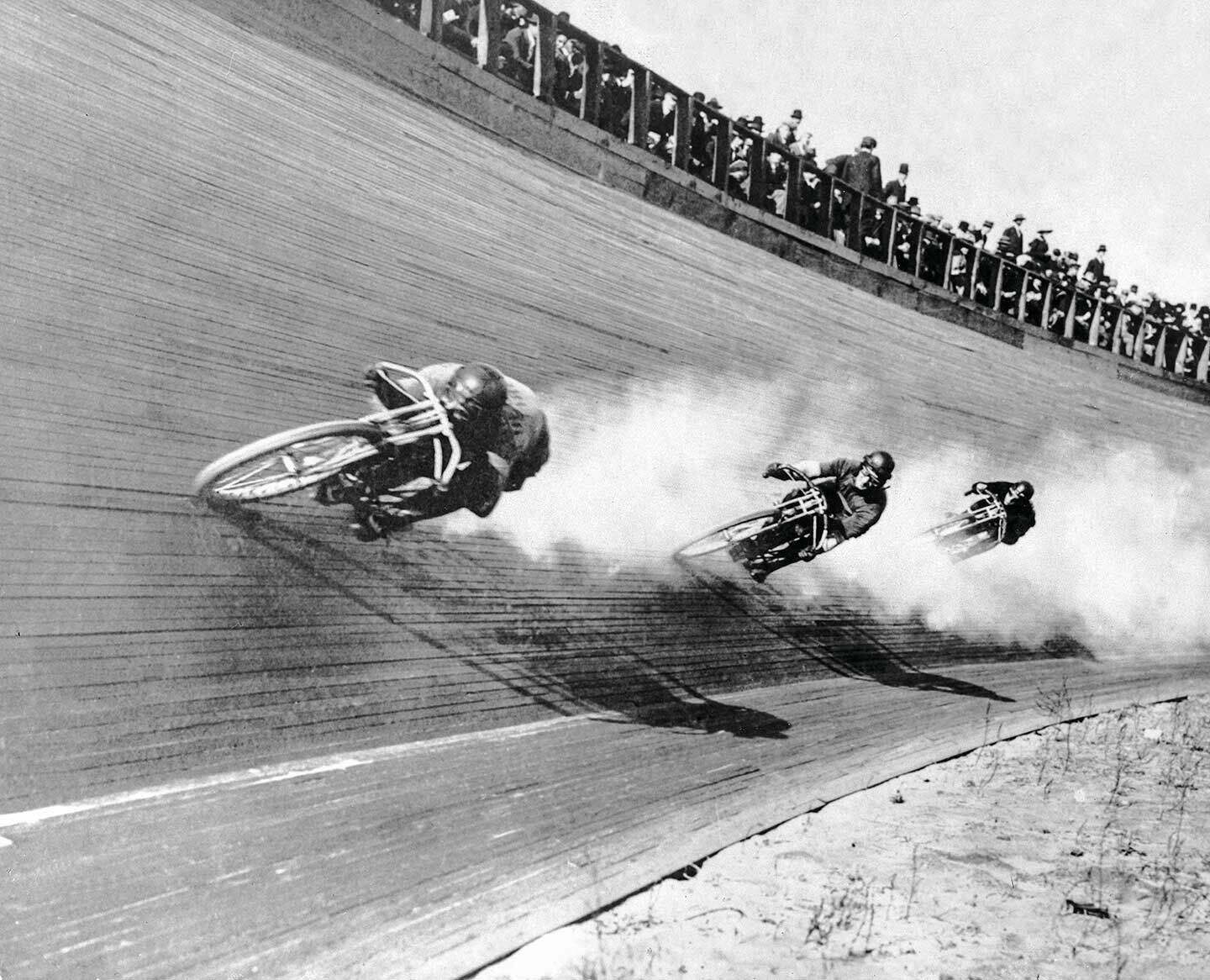 Joe Wolters, Jake DeRosier, and Charles Balke, all on Excelsiors, in the Class A heats at the opening day of racing at the Los Angeles Stadium in 1912.