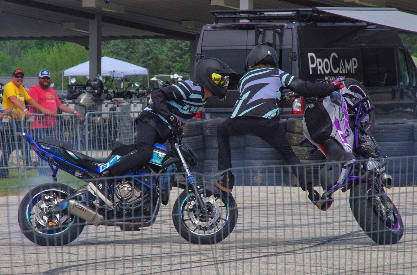 Those magnificent men and their stunting machines: Stunt riders entertain the masses on Saturday afternoon.