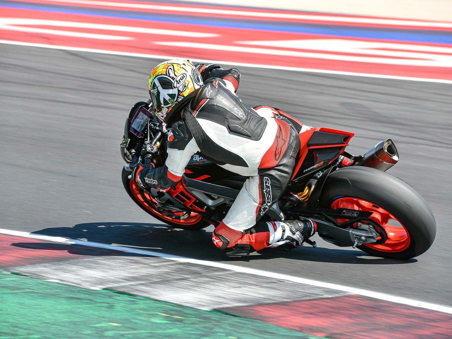 Fact: Motorcycles are more fun when you’re riding them dressed head to toe in leather. A 2022 Aprilia RSV Tuono being put through its paces by an official Aprilia test rider.
