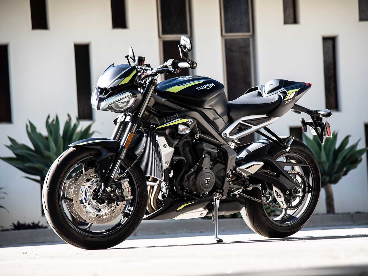 Triumph’s Street Triple RS maintains its streetfighter styling through jagged bodywork and exposed mechanicals.