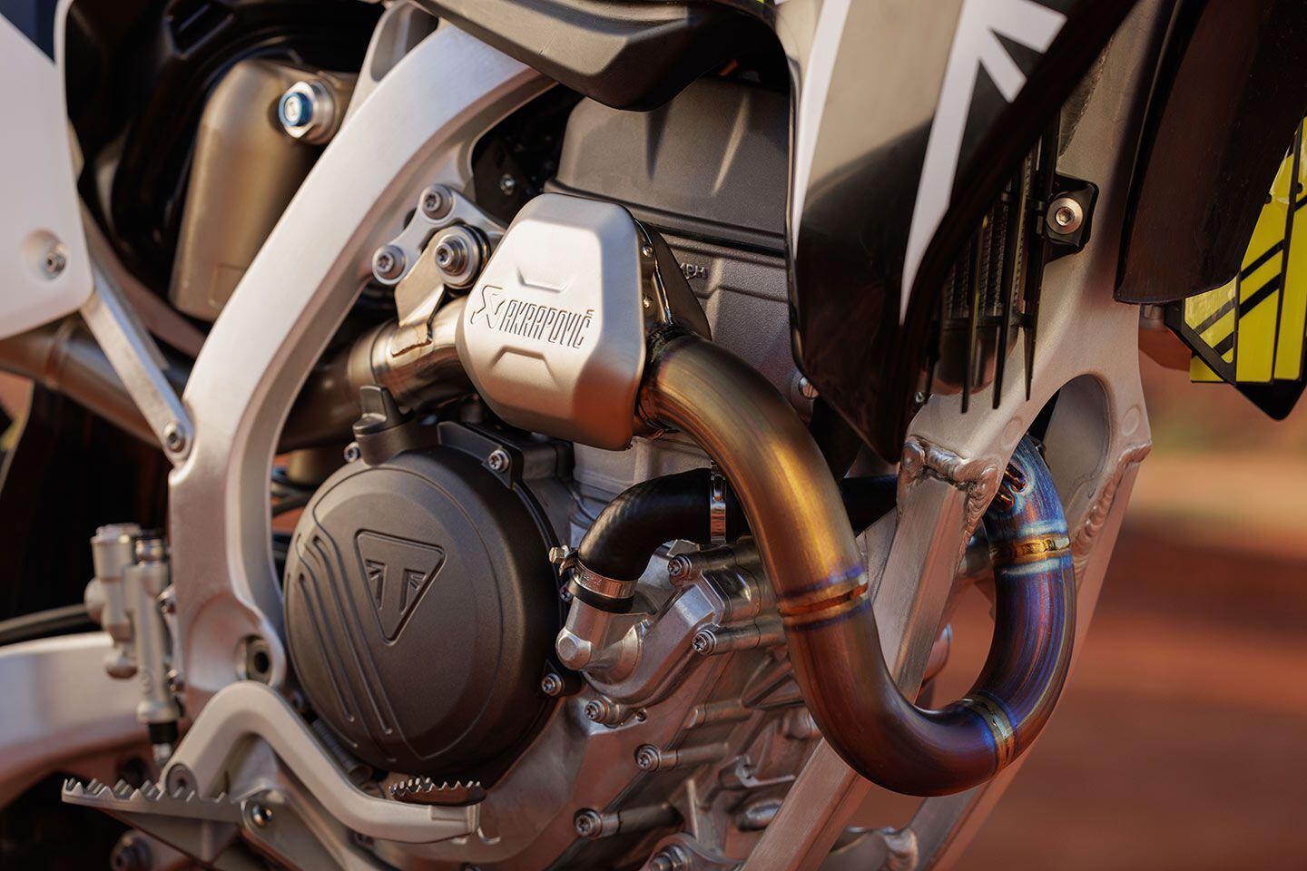 The new 250cc single has aluminum pistons, magnesium covers, titanium valves, and low-friction coatings.