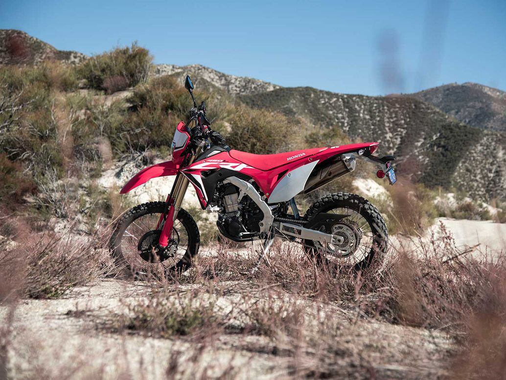 Mirrors fold back when riding through brush, making the CRF easily adaptable to rough terrain.