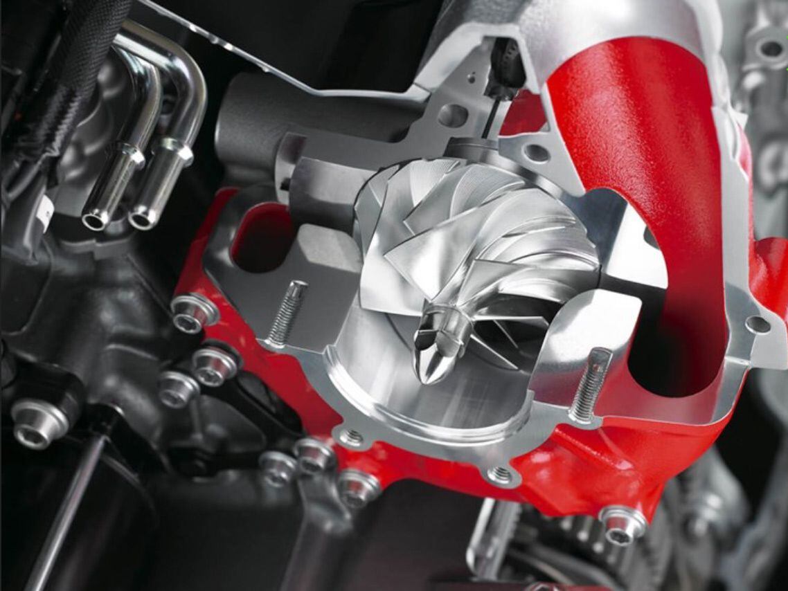 The supercharger impeller reaches speeds of nearly 130,000 rpm, at which point it pumps more than 200 liters of air/second into the engine.