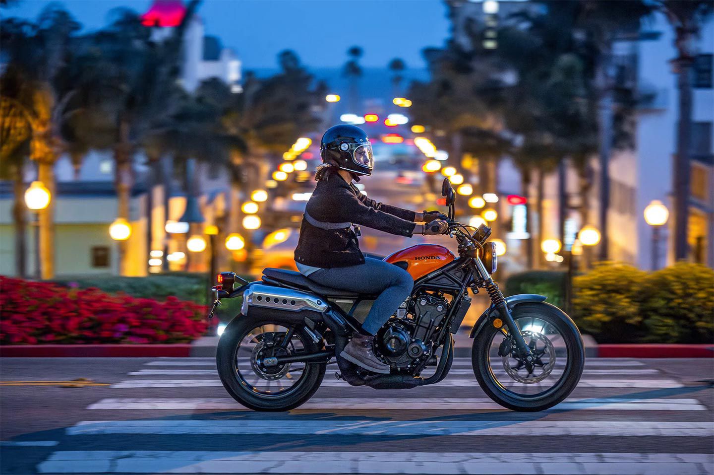 Here’s what you might look like aboard the Honda SCL500 while scrambling around in urban environments after dark.