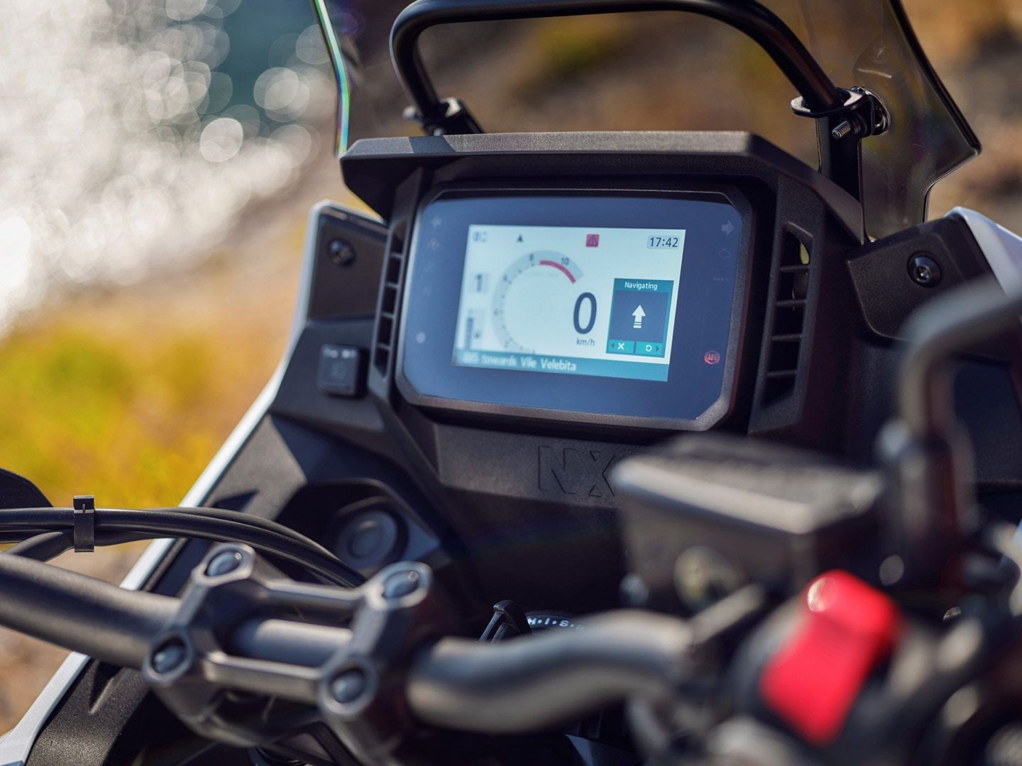 The new full-color 5-inch TFT display is borrowed from the XL750 Transalp model, but uses optical bonding for a clearer image in sunlight.