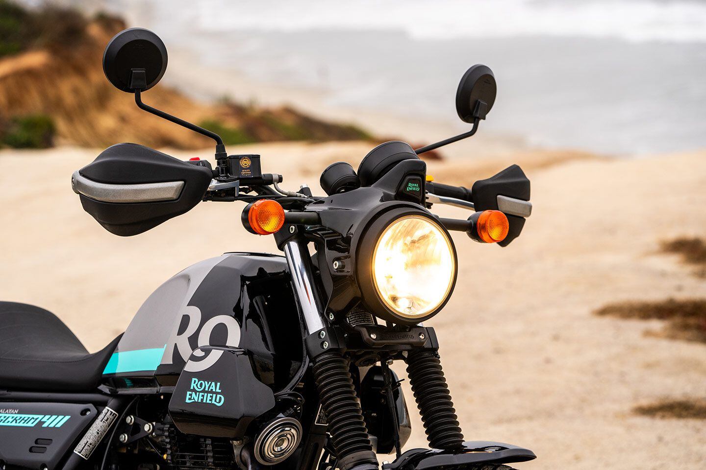 The Scram 411 employs a large-diameter halogen headlight that throws off a surprisingly deep swath of light during night rides (with high beam enabled).