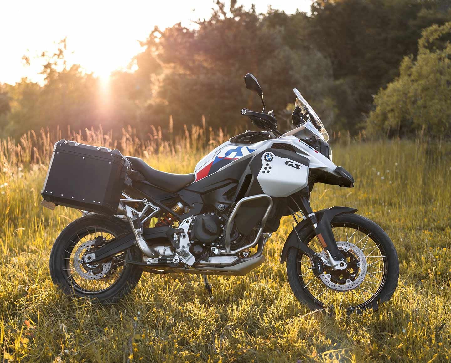 The 2024 BMW F 900 Adventure drops some weight and adds the new engine and suspension, but retains its larger 6-gallon fuel tank and bulkier tailsection.