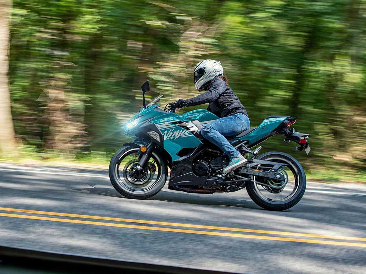 The 2021 Ninja 400, shown here, stands out with teal paint.