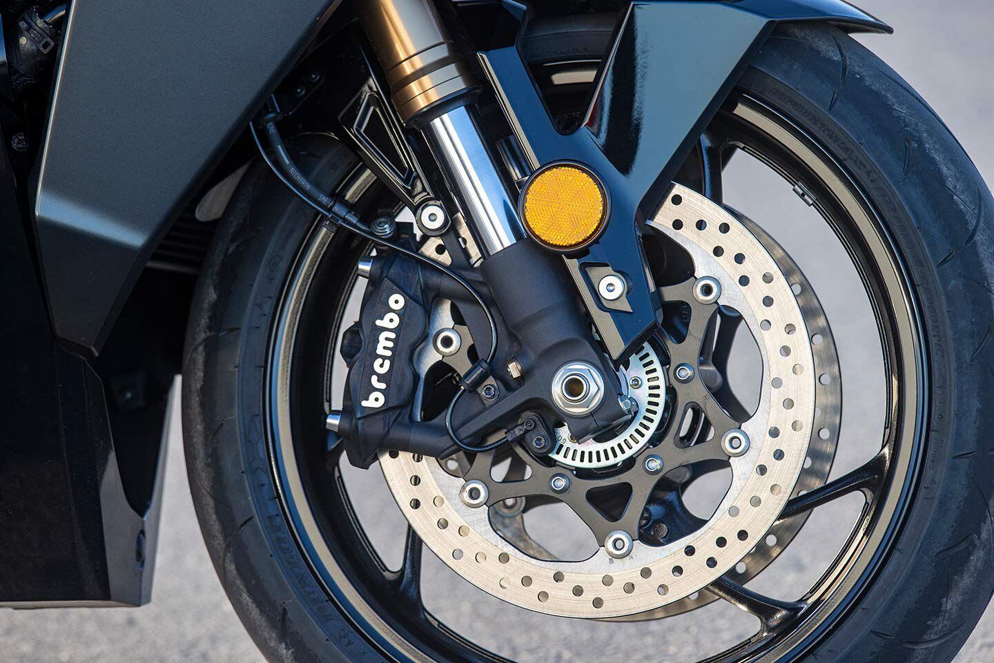 Brembo front brakes don’t have an aggressive initial bite, but power ramps up through the pull and brings a loaded-down GT+ to a stop with relative ease.