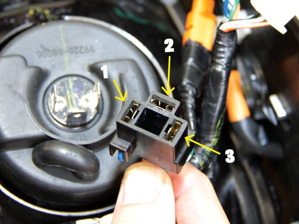 QUESTION Why Does My Headlight Dim As RPMs Drop? Motorcyclist