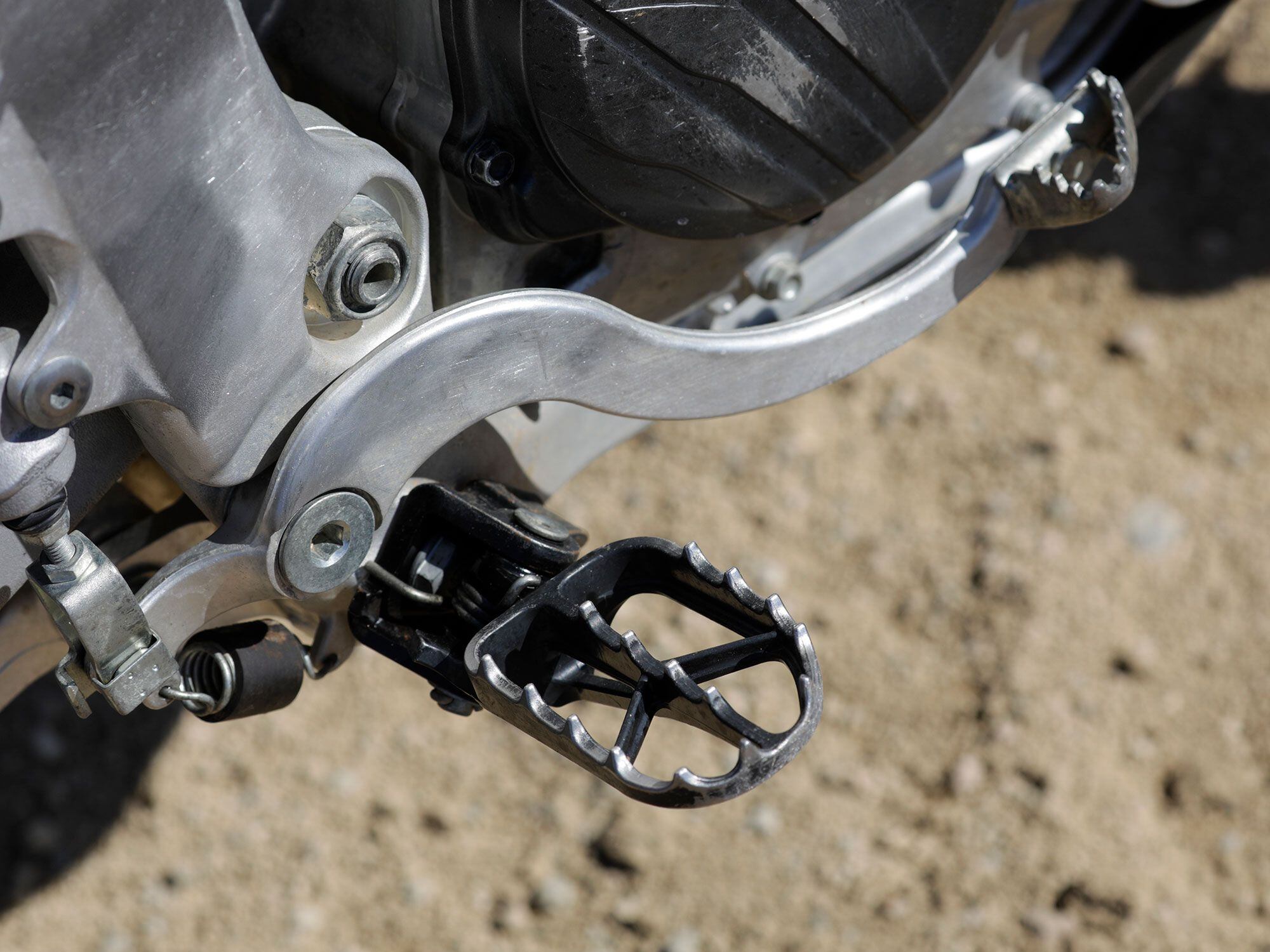 A sturdy set of footpegs provide good grip against the rider’s boots.