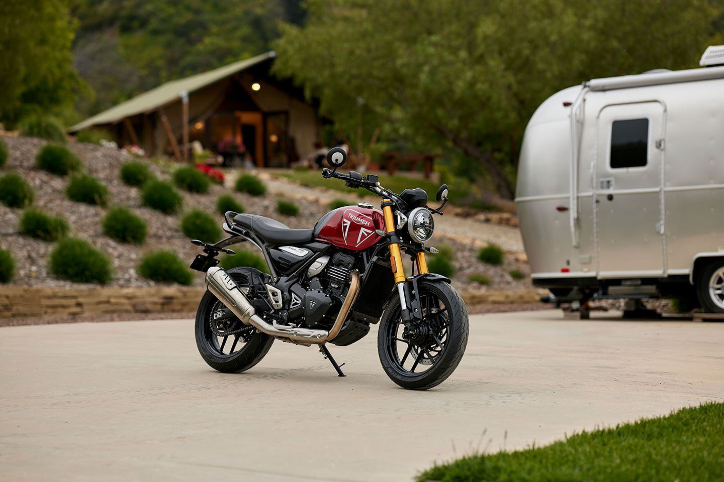 The new 2024 Triumph Speed 400, with a really lovely Airstream trailer in the background.
