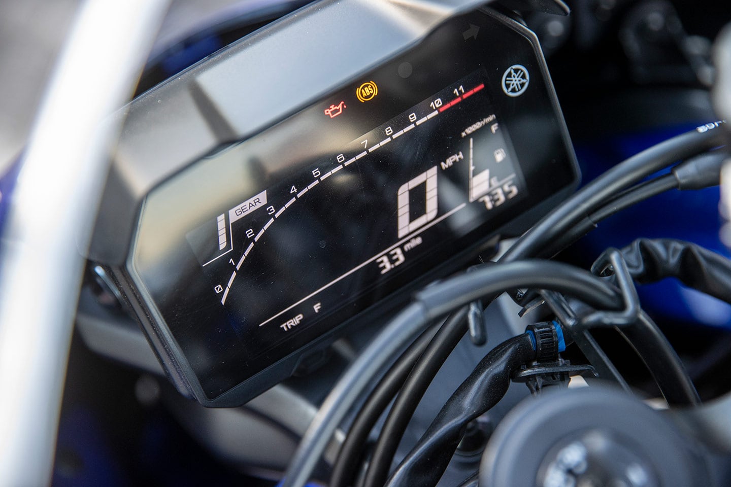 Electronics aren't the R7's thing. There are no ride modes or electronic rider aids, meaning there's not much to adjust through this LCD display. The display is tucked into the front fairing and covered by a few wires, meaning it can be hard to see at times.
