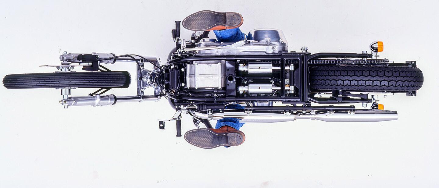 What pavement saw in 1984: underside view of the 1984 FXST Softail. Note the twin shocks that extend instead of compressing. Their placement under the frame and gearbox helped preserve the hardtail aesthetic while offering good suspension and much-improved handling.