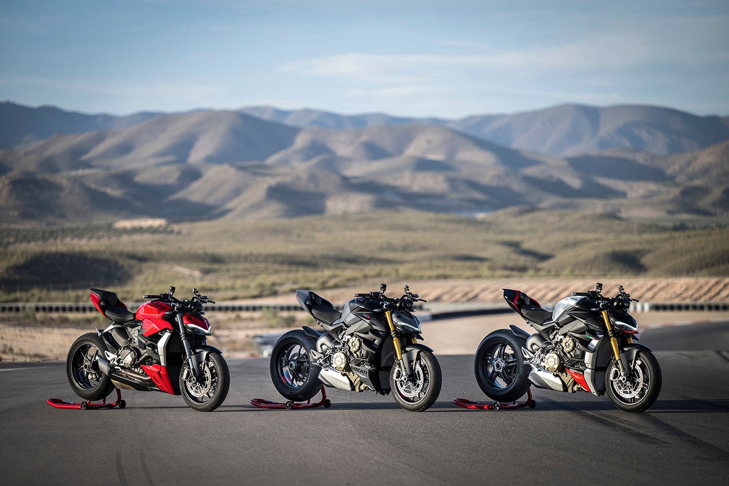 From left to right: the base-model Streetfighter, the V4 S in Grey Nero, and the V4 SP2.