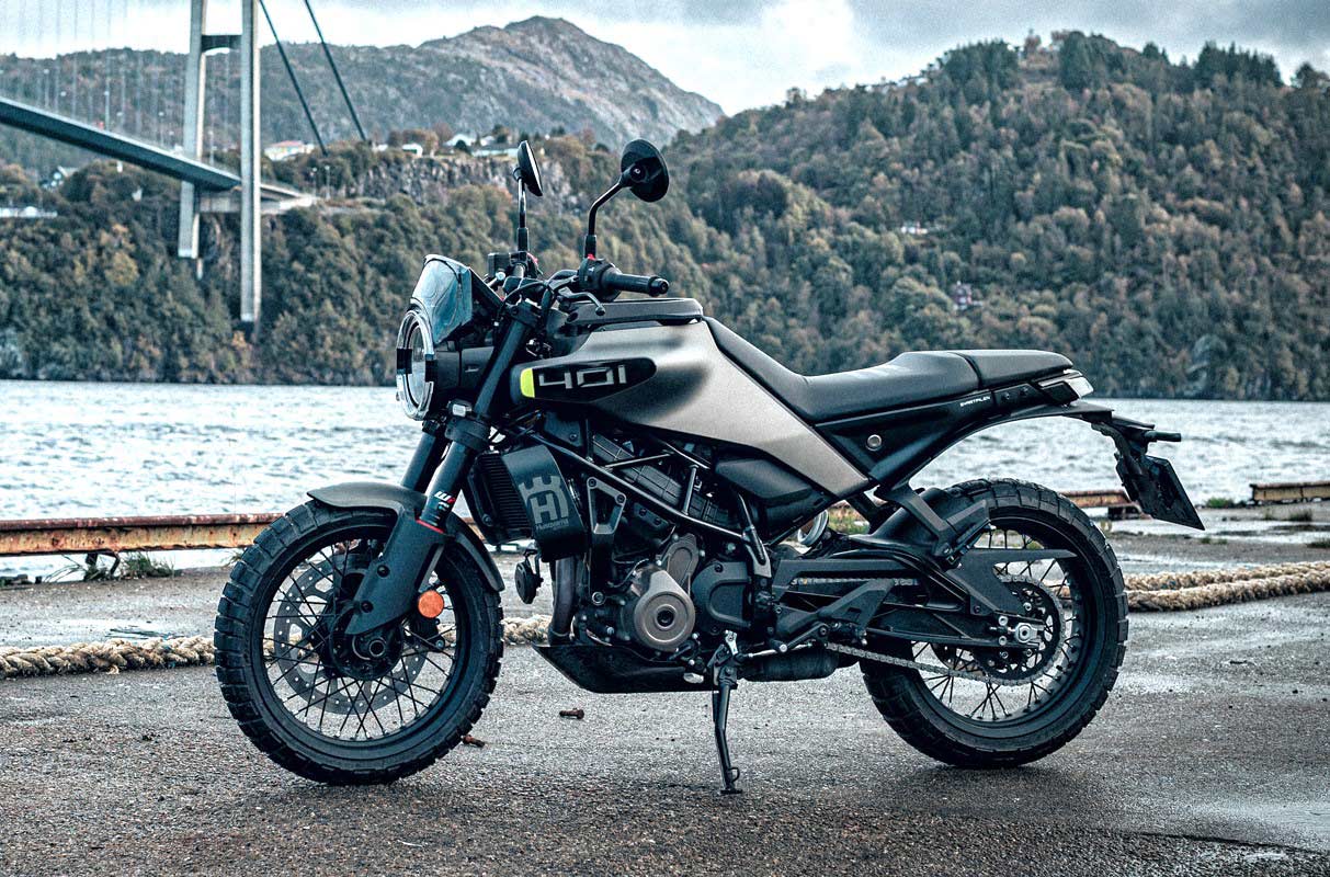 Updated for 2024, the stylish Svartpilen 401 brings a larger motor, revised ergos, and adjustable suspension, yet stays below 400 pounds.