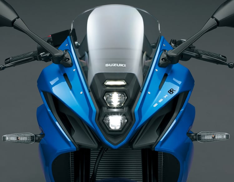 The central LED headlights and fairing intakes share a strong family resemblance with decades of GSX-Rs.