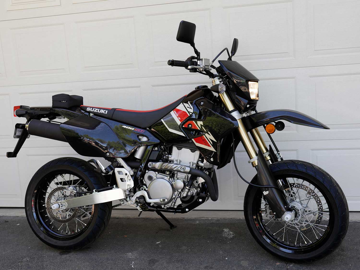 Senior Editor Adam Waheed let this 2021 Suzuki DR-Z400SM rip on city streets for a long-term review. The verdict? Loads of fun.