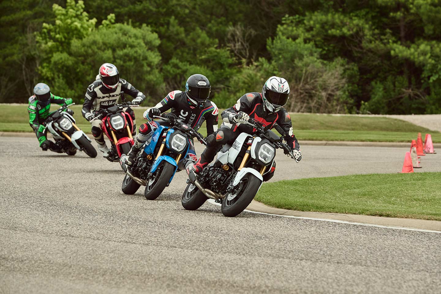 Racing 2025 Honda Groms at the Barber Small Bore.