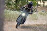 2025 Can-Am Origin electric dual sport bike riding on trail